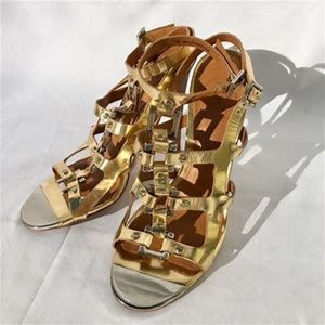 Tory Burch gold gladiator heels